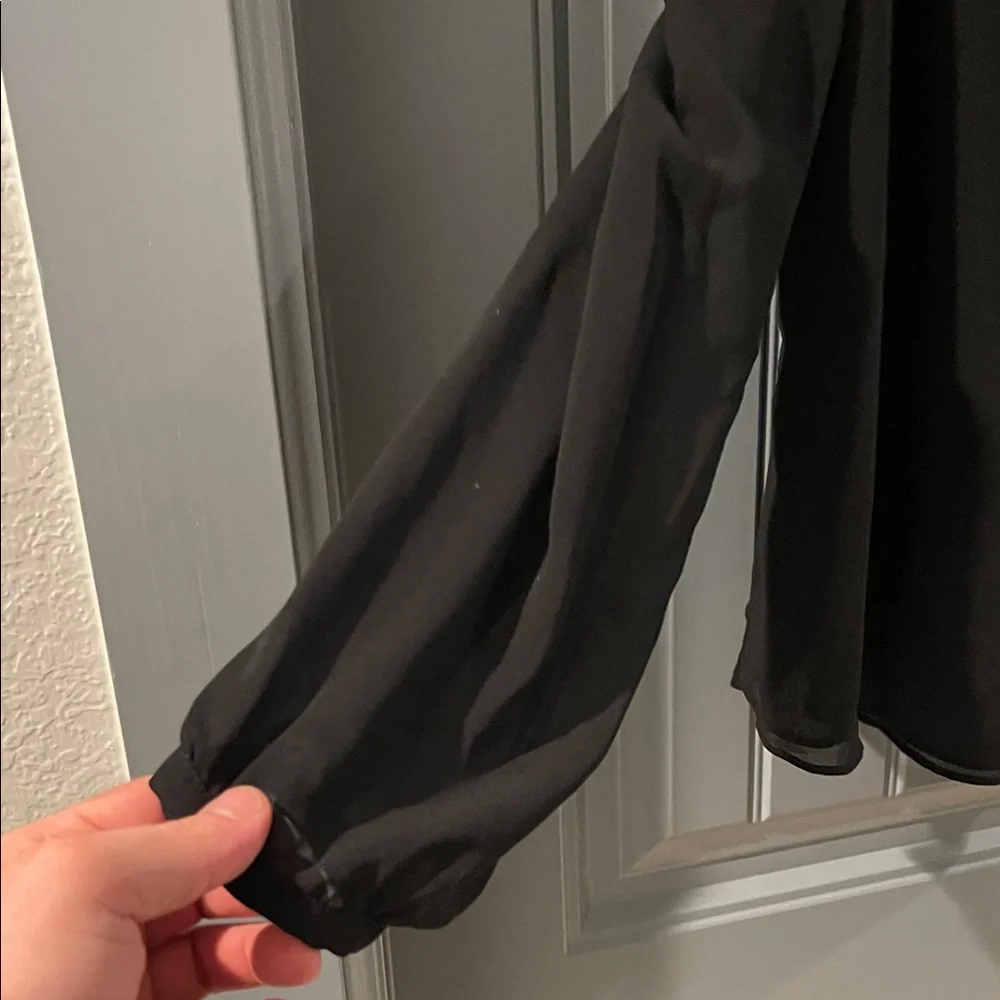 Chic Black Ruffle Sleeveless Blouse - Picture 5 of 7